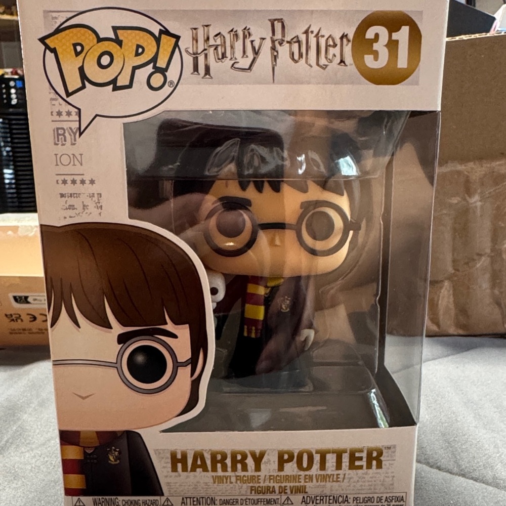Funko Harry Potter Vinyl Figure with Red and Yellow Scarf